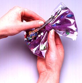 hair bow with see-through pocket