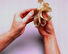 Make another pair of loops with the ribbon.