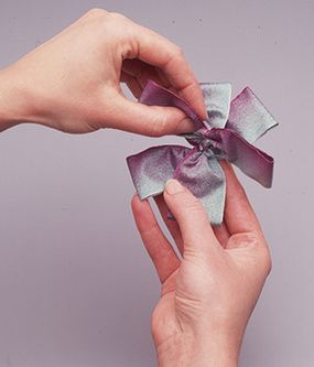 Create a pinwheel by stacking the bows.