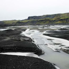 Cloudy meltwater caused by rock flour on the Myrdalsjokull Glacier.