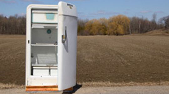 Why is the back of a refrigerator painted black?