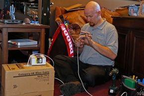 A technician performing a home installation of Google Fiber during the Provo, Utah rollout.