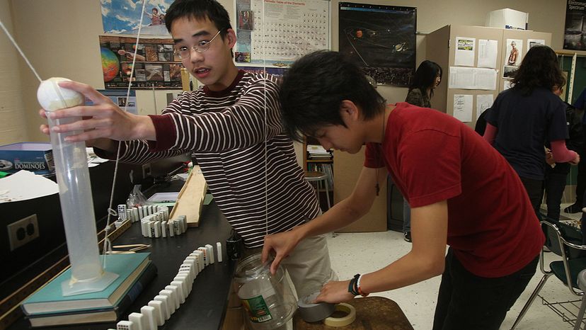 students building a Rube Goldberg machine