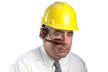 man in hardhat wearing a Golden-i computer device