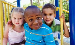 three kids at playground