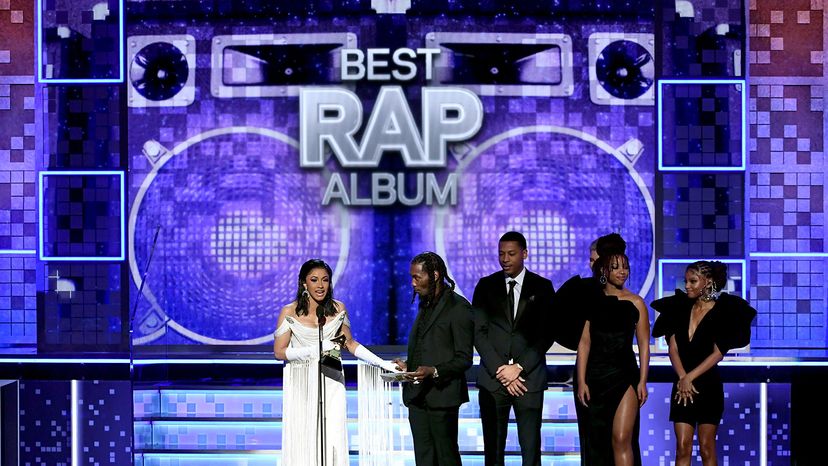 Cardi B, Offset, and Brooklyn Johnny accept the Best Rap Album for 'Invasion of Privacy' from Chloe Bailey and Halle Bailey