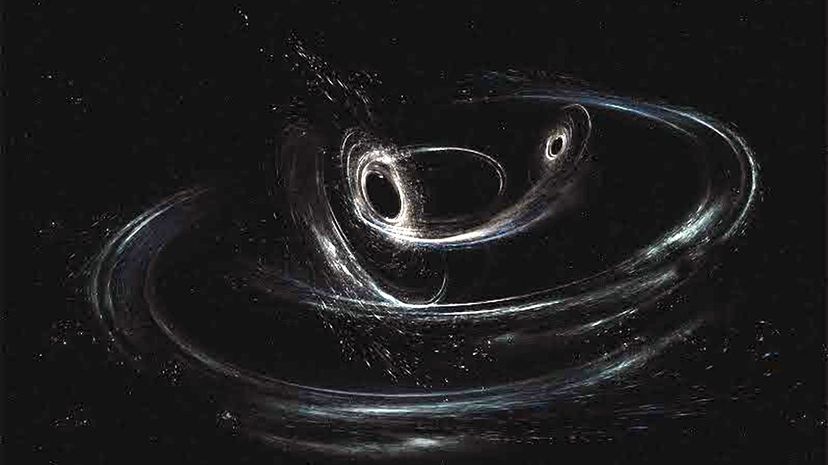 This artist's conception shows two merging black holes similar to those detected by LIGO. The black holes are spinning in a non-aligned fashion, which means they have different orientations relative to the overall orbital motion of the pair. LIGO/Caltech/MIT/Sonoma State (Aurore Simonnet)