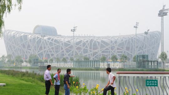 What is China doing to create a green Olympics?