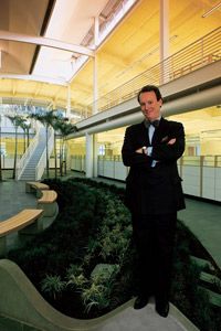 Green-collar jobs also include professions in the design field. The architect William McDonough stands in a green building he designed.
