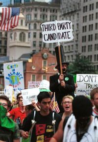Green Party supporters protest before a presidential debate.