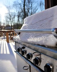 Snow-covered grill.