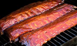 Barbecued ribs on the grill.