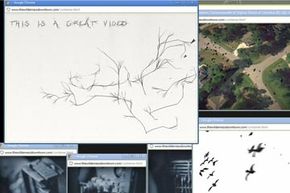 This shot shows "The Wilderness Downtown" in action with a flock of bird silhouettes flying between windows, including an aerial view of the street you typed in at the start of the video.”border=