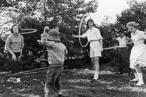 Hula hoop fever grips a 1950s family.