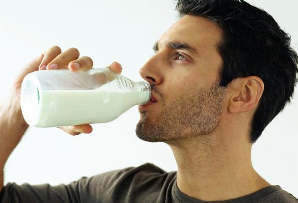 man drinking milk