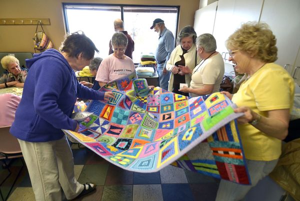 An Albuquerque, N.M. Project Linus group, shown here at the Bear Canyon Senior Center, donates nearly 4,000 homemade blankets to those in need each year. 