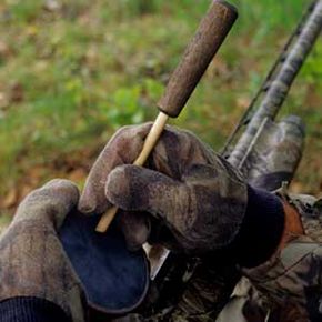 Close-up of a turkey hunter working a slate call