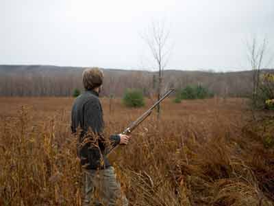 One hunter man outdoors.