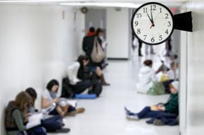 group waiting by clock