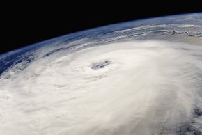 Hurricane Hellene, seen here in a photo captured from aboard a 2006 space shuttle mission, rages through the Earth's atmosphere. See more storm pictures.