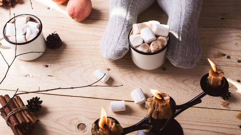 woolly socks, candles and a mug of cocoa.