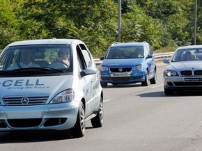 Hydrogen-powered vehicles from Daimler, Volkswagen and BMW cruise on a New York highway. The cars were part of a 31-city, Hydrogen Road Tour that also includes hydrogen-powered vehicles from GM, Honda, Hyundai, Kia, Nissan and Toyota.