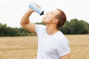 athlete drinks water