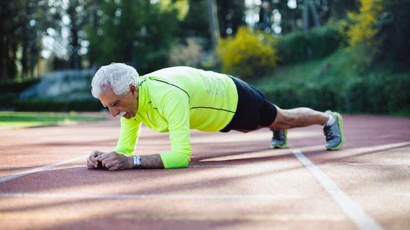 senior man doing pushups