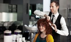 Your hair stylist may love you right back, but he'll also want to protect his business.