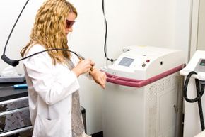 Specialist testing hair removal equipment.
