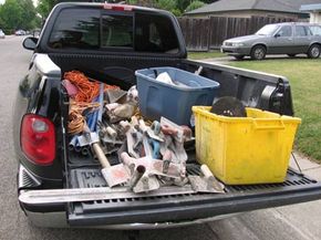 What does it mean to call a pickup truck a '1/2 ton truck' (also known as a  'half-ton truck')?