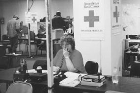 When deadly floods struck central and southern Texas in mid-October 1998, amateur radio operators from four states volunteered their time. Susan Manor, NF0T, is shown helping with communications at the New Braunfels Red Cross office.