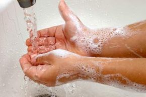 Child washing hands.