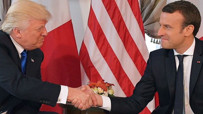 The infamous handshake between U.S. President Donald Trump and French President Emmanuel Macron at the U.S. ambassador's residence, on the sidelines of the NATO summit, in Brussels, on May 25, 2017. MANDEL NGAN/AFP/Getty Images