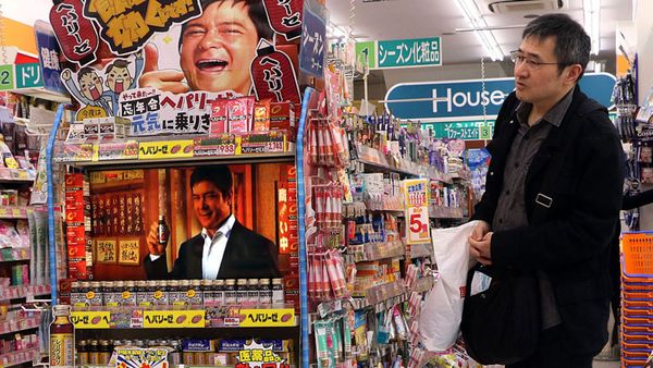 Japanese man looks at a display for Hepalyse