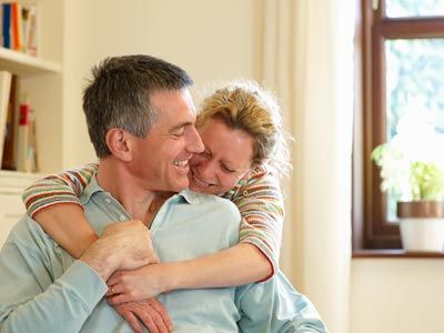 happy, smiling middle-aged couple