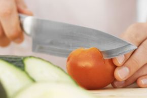If your tomato slices tend to be mushy or mangled, a dull knife may be the culprit.  
