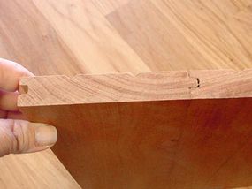 Pieces of plank flooring lock together