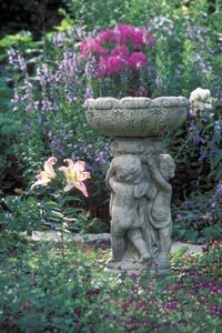 In this garden, although the vegetation is more interesting, the birdbath gives your eye an anchor on which to rest.