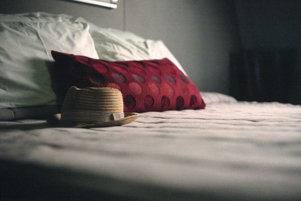 hat on top of bed