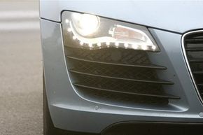 The headlight of an Audi R8 sports car in Grevenbroich, western Germany