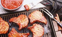 Marinated pork chops on grill