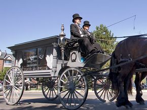 A horse drawn hearse carries a casket to the graveyard in Newark, N.J. Looking at this photo, it's easy to see why hearses have always been considered a little spooky and mysterious.­
