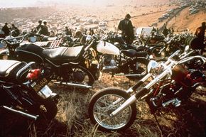 Motorcycles crowd the field at the infamous &quot;Gimme Shelter&quot; rock concert featuring the Rolling Stones. A fan was stabbed to death by a member of the Hells Angels motorcycle club on Dec. 8, 1969, at the Altamont Speedway in Livermore, Calif.