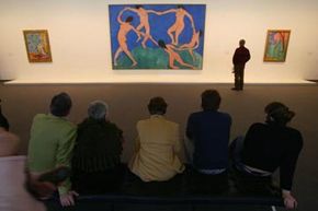 Visitors look at Matisse's &quot;Dance&quot; at a Museum of Modern Art exhibit in Berlin.