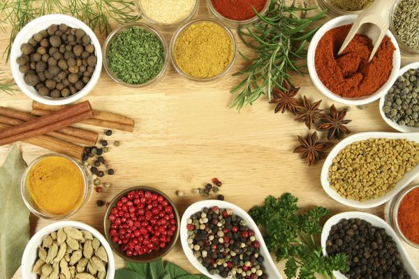 Spices and herbs on table