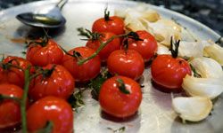 Tomatoes and garlic: the new peanut butter and jelly. See pictures of international tomato dishes.