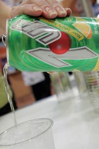 The makers of 7Up, which includes high-fructose corn syrup as an ingredient, dropped their claim that the product was "all natural" after being threatened with a lawsuit by a consumer advocacy group.”width=