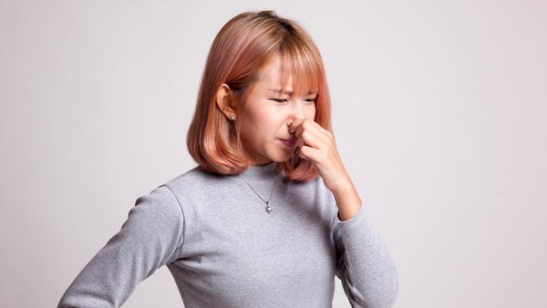 woman holding her breath