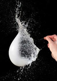 A water balloon just as it bursts.